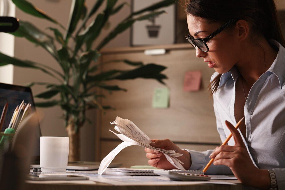 Accountant calculating budgets in an office in Lima