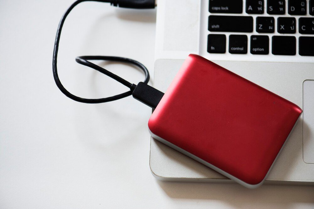 External hard drive connected to a laptop