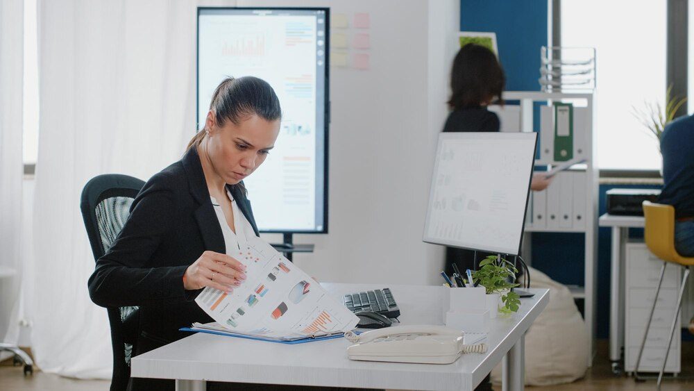 A business manager reviewing the report with the audit findings