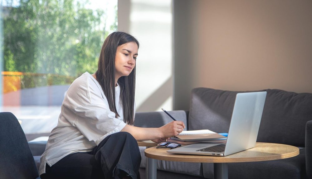Student following an online course from their computer