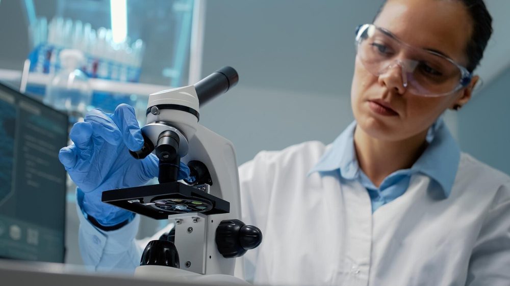 Laboratory technician analysing samples